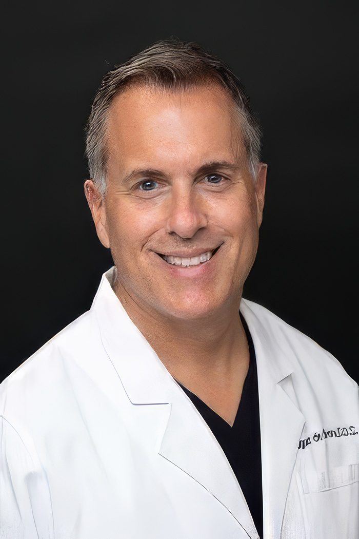 Dr. August de Oliveira, DDS